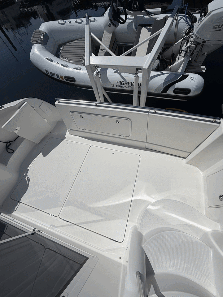 Original customer boat deck cycling through Teak, Diamond, and Fish Scale flooring previews